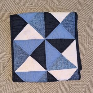 Elegant Blue and White Patchwork Quilt
